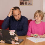 dad and son frustrated over homeschooling challenges