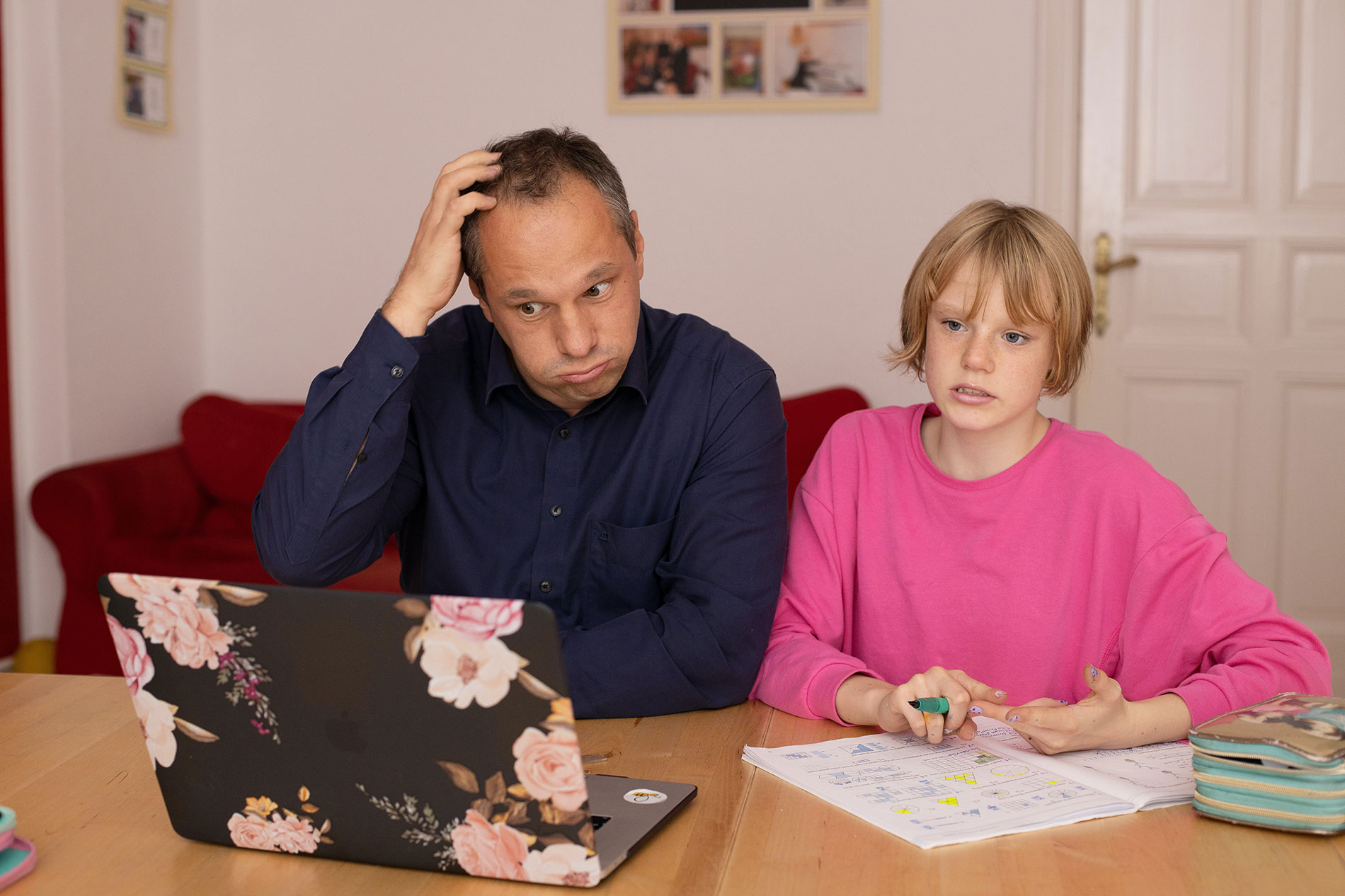 dad and son frustrated over homeschooling challenges